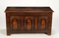 Lot 1327 - An 18th Century oak coffer, the twin plank top...