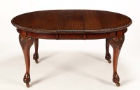 Lot 1330 - A Chippendale revival mahogany dining table,...