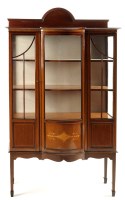 Lot 1331 - An Edwardian inlaid mahogany display cabinet...