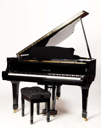 Lot 1332 - A baby grand piano by Yamaha, in bright...