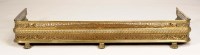 Lot 1340 - An early 19th Century brass fender, with...