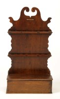 Lot 1343 - An oak spoon rack with swan neck pediment and...