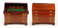 Lot 1347 - A Georgian mahogany bureau, the fall-flap with...