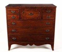 Lot 1356 - A Georgian mahogany chest of drawers, the top...