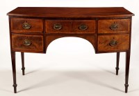 Lot 1358 - A Georgian mahogany bowfront sideboard, fitted...