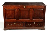 Lot 1375 - An 18th Century oak panelled mule chest, the...