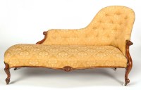 Lot 1381 - A mid Victorian walnut chaise longue, the...