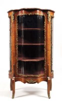 Lot 1390 - A late 19th Century French walnut vitrine...