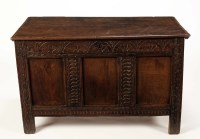 Lot 1422 - An early 18th Century oak coffer with hinged...