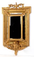 Lot 1423 - A late 19th Century gilt cushion frame wall...