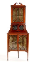 Lot 1424 - An Edwardian inlaid mahogany standing corner...