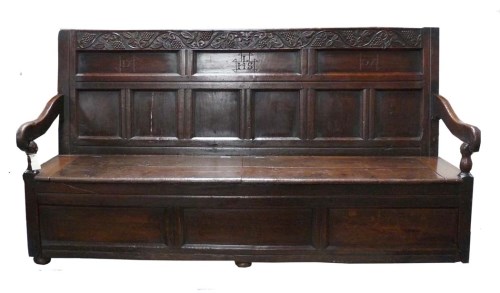 Lot 1430 - A late 17th Century oak settle, with carved...