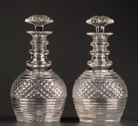 Lot 231 - † A pair of cut glass decanters, first half...