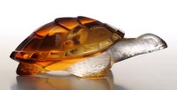 Lot 236 - A Lalique Tortoise, the body amber, the head...