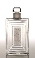 Lot 237 - ''Duncan'': a Lalique perfume flask, with two...