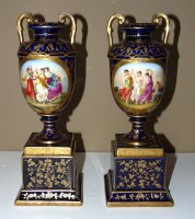 Lot 252 - A pair of Vienna style vases and stands, circa...