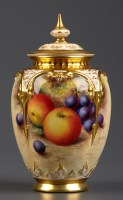 Lot 267 - Royal Worcester: a covered vase with pierced...