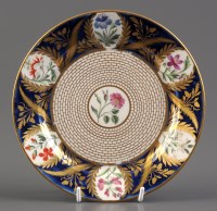 Lot 276 - † A Chamberlains Worcester plate, decorated in...