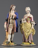 Lot 285 - † A pair of Continental bisque porcelain male...
