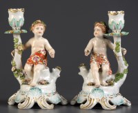 Lot 290 - † A pair of late 19th Century candle holders,...