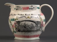 Lot 309 - A well decorated Sunderland jug, printed in...