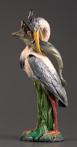 Lot 340 - Minton: a Majolica heron with a fish in its...