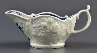 Lot 359 - A Worcester blue and white moulded cream jug,...