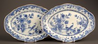 Lot 400 - † Two 18th Century blue and white oval plates,...
