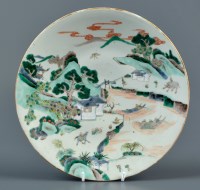 Lot 425 - A Famille Vert plate, in Kangxi style, but...