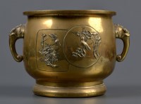 Lot 437 - † A brass planter, circa 1900, with elephant...