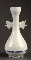 Lot 458 - A vase with garlic neck, of slender pear form...