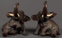 Lot 472 - A pair of Japanese bronze elephant ornaments,...