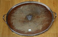 Lot 712 - † An EPNS and oak two-handled tea tray,...