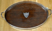 Lot 713 - † An EPNS and oak two-handled tea tray, oval...