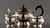 Lot 803 - A George V three-piece tea service, by F. Ltd.,...