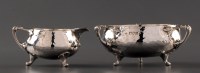 Lot 869 - An Edwardian three-handled sugar bowl and...