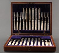 Lot 875 - A set of twelve Edwardian fruit knives and...