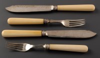 Lot 884 - A set of twelve Edwardian ivory handled fish...