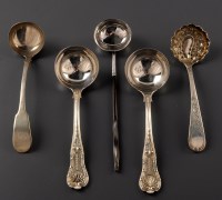 Lot 886 - A pair of George V sauce ladles, by Goldsmiths...