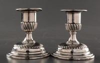 Lot 902 - A pair of Victorian dwarf candlesticks, by...