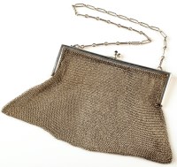 Lot 916 - An early 20th Century white metal evening bag,...