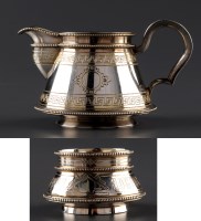 Lot 963 - A 19th Century Russian silver cream jug, by...