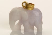 Lot 1008 - A carved stone elephant pattern charm,...