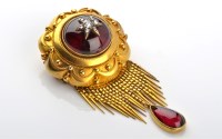 Lot 1016 - A Victorian garnet, diamond and gold brooch, c....