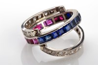 Lot 1022 - A ruby, sapphire and diamond ring, c.1910, the...