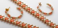 Lot 1057 - A cultured pearl and coral necklace set with...