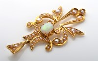 Lot 1065 - An Art Nouveau opal, seed pearl and yellow...