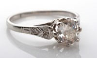 Lot 1068 - A diamond ring, c.1900, the central old...