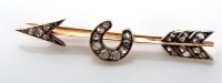 Lot 1075 - A diamond arrow pattern brooch, c.1890, the...