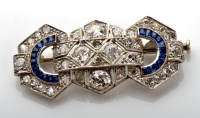 Lot 1083 - An Art Deco sapphire and diamond brooch, the...